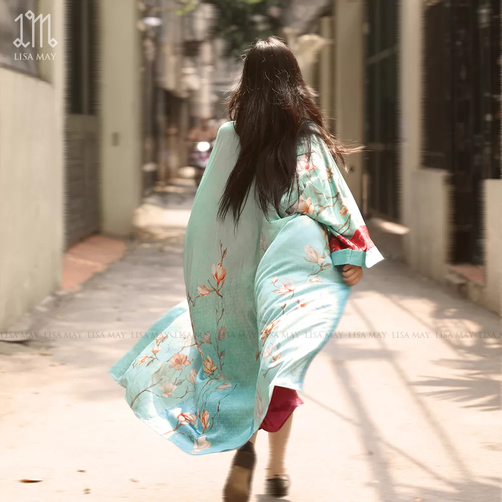 Áo kimono thiết kế họa tiết hoa mộc lan cam nền xanh lá